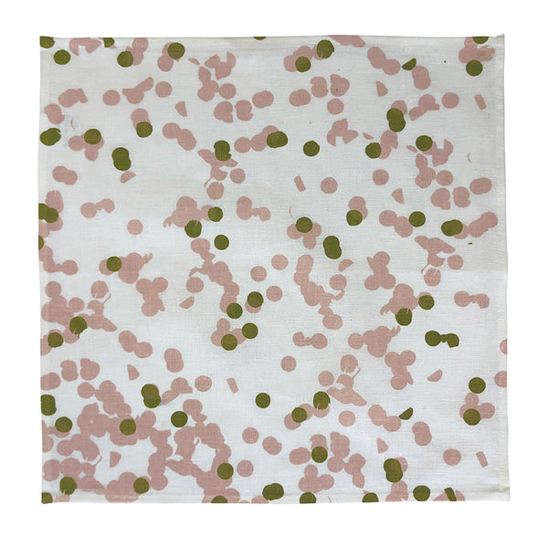 Confetti circle pattern on beige napkin set with peach pink and green colours