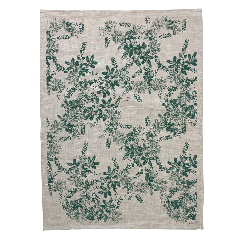 Linen tea towel with green wattle pattern