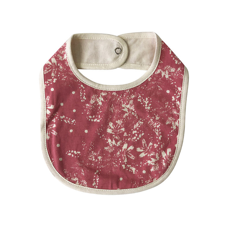 Baby bib with pink wattle print